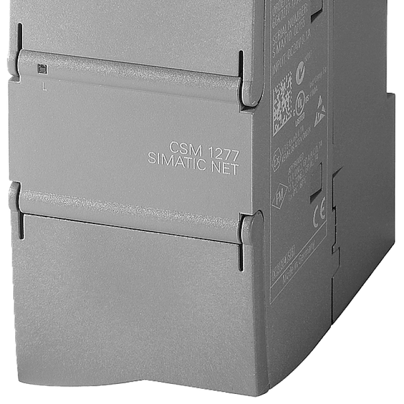 نمای نزدیک از یک دستگاه الکترونیکی خاکستری در پس زمینه سیاه