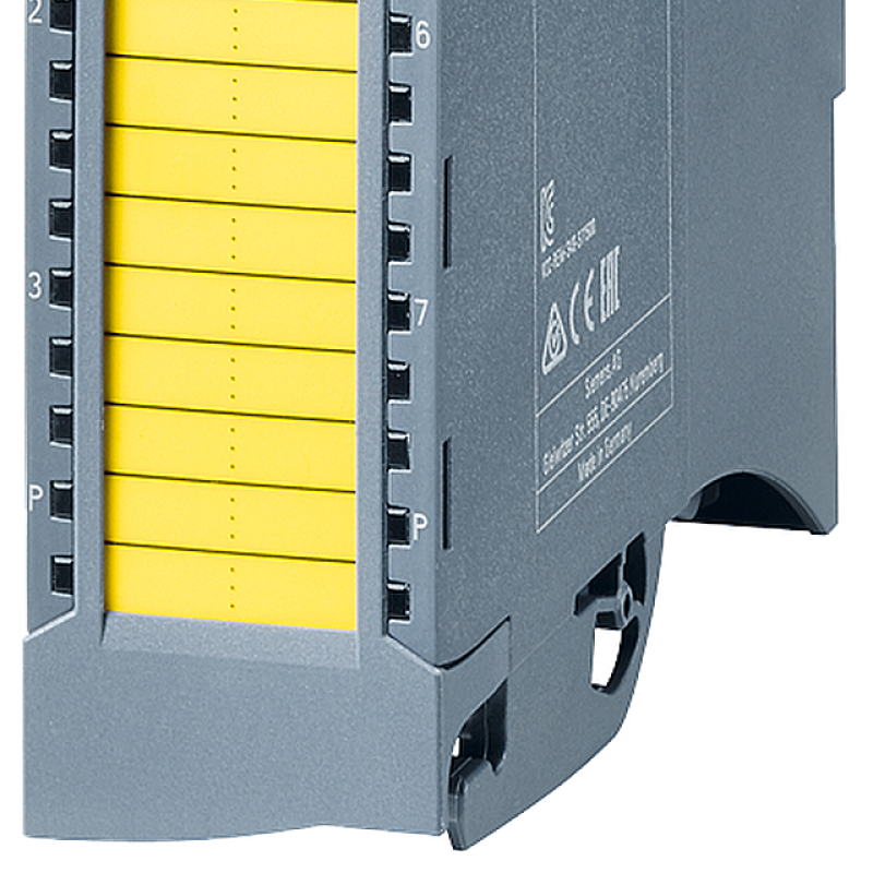 نمای نزدیک از یک دستگاه زرد و سیاه در پس زمینه سیاه