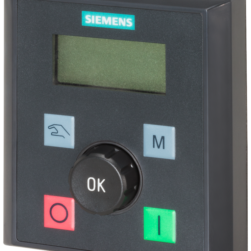 a close up of a control panel with a green button