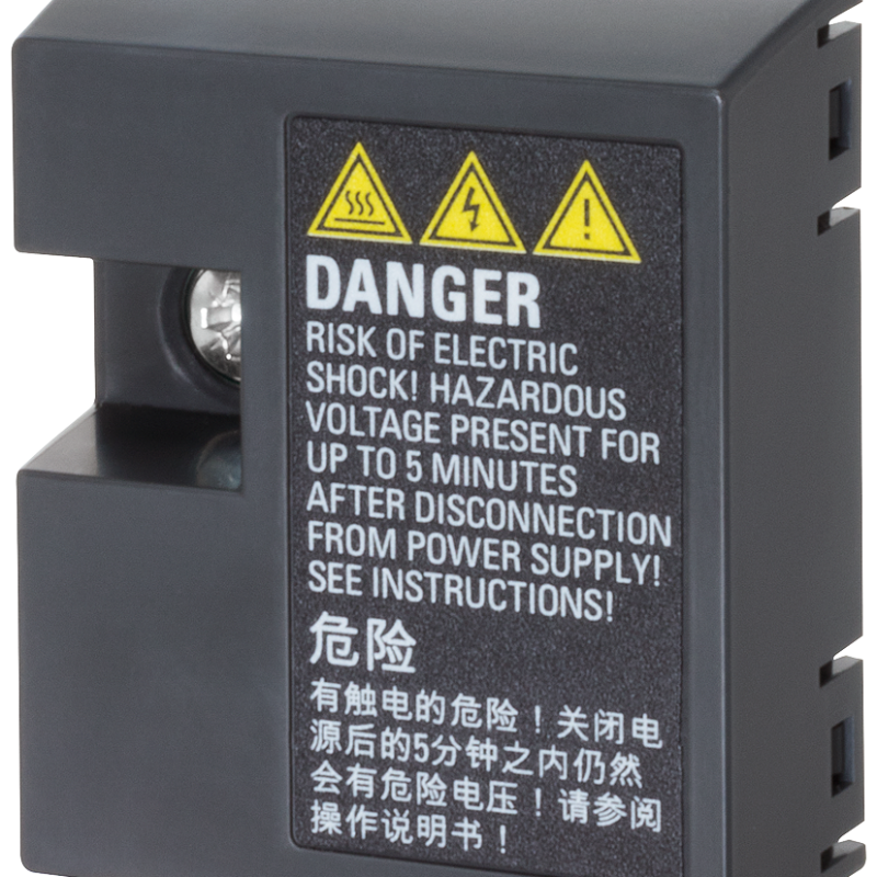 a close up of a black and yellow warning sign on a black device